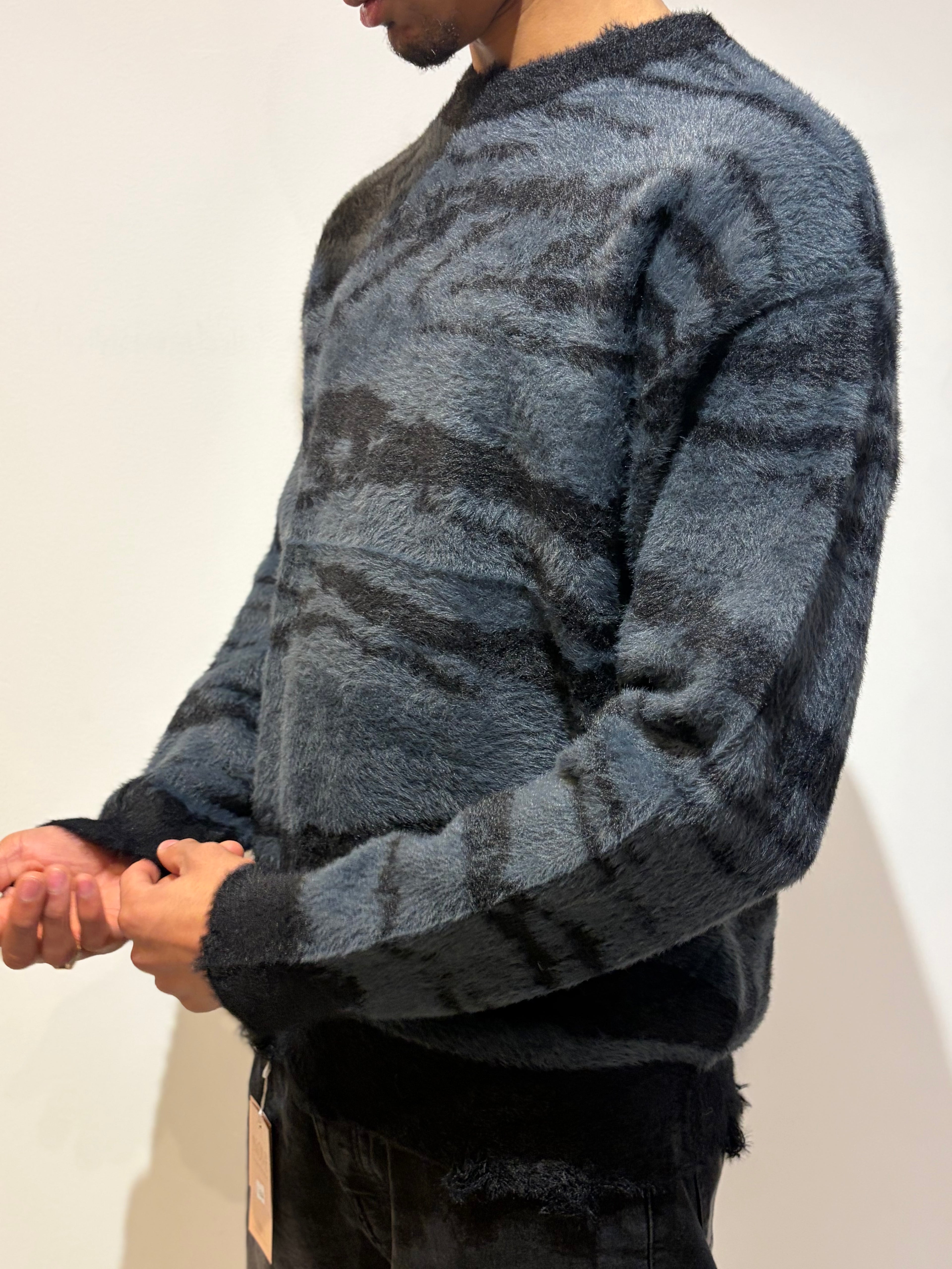 Pull au design zébré effet peluche