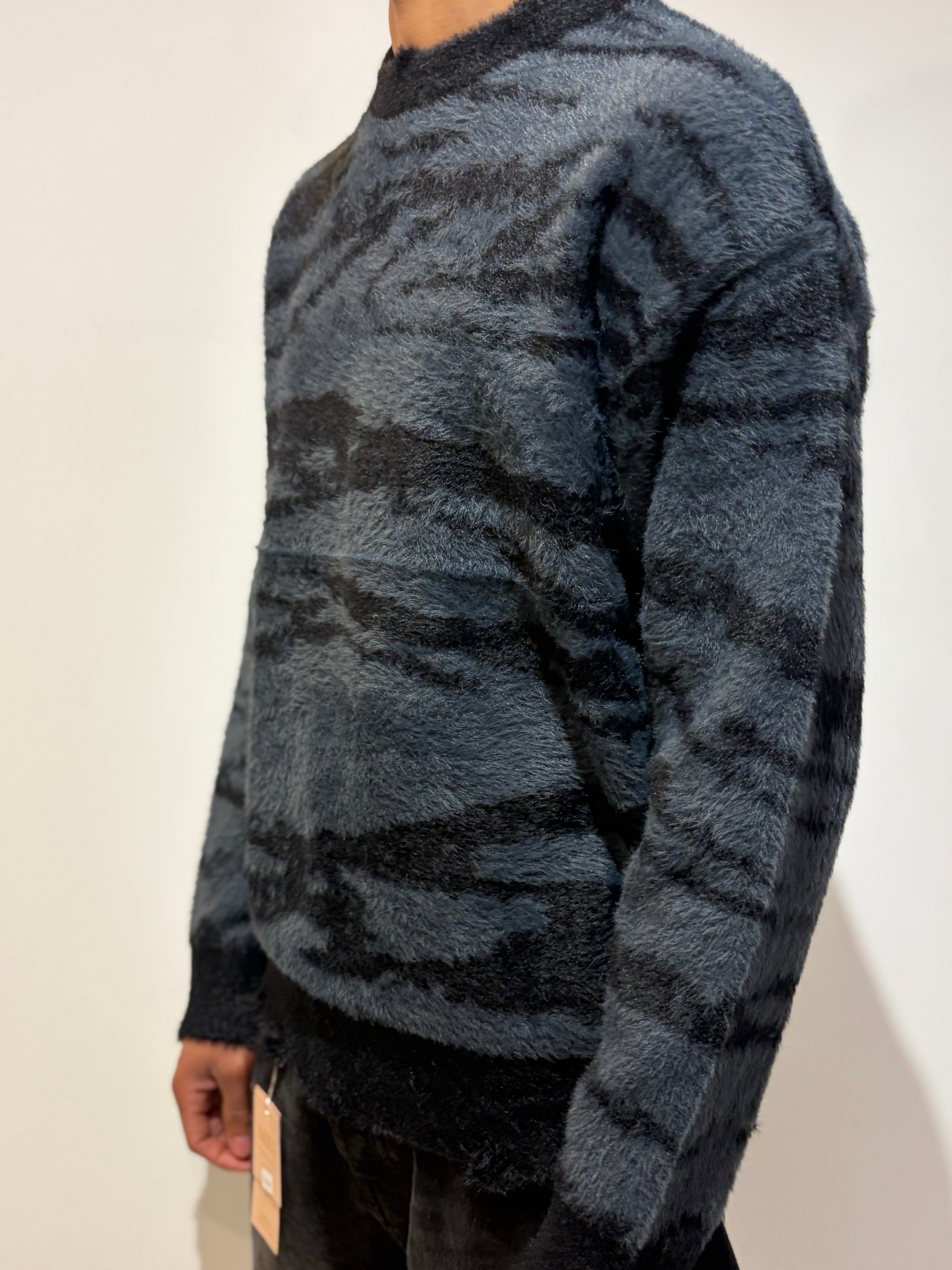 Pull au design zébré effet peluche