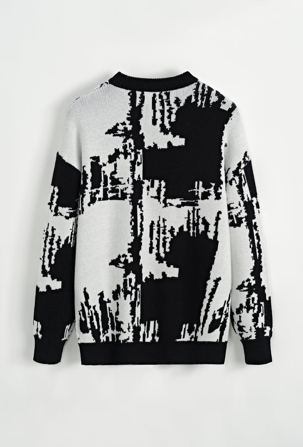 Frilivin black and white abstract design sweater